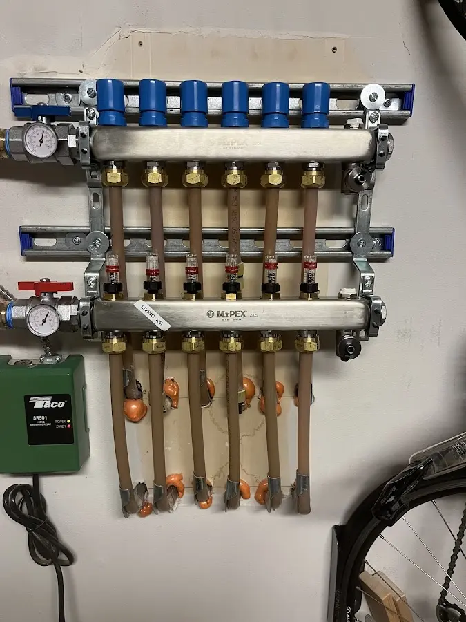 Plumber performing Water Heater Repair at a residential property in Delaware